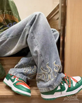 Jeans With Embroidered Flames